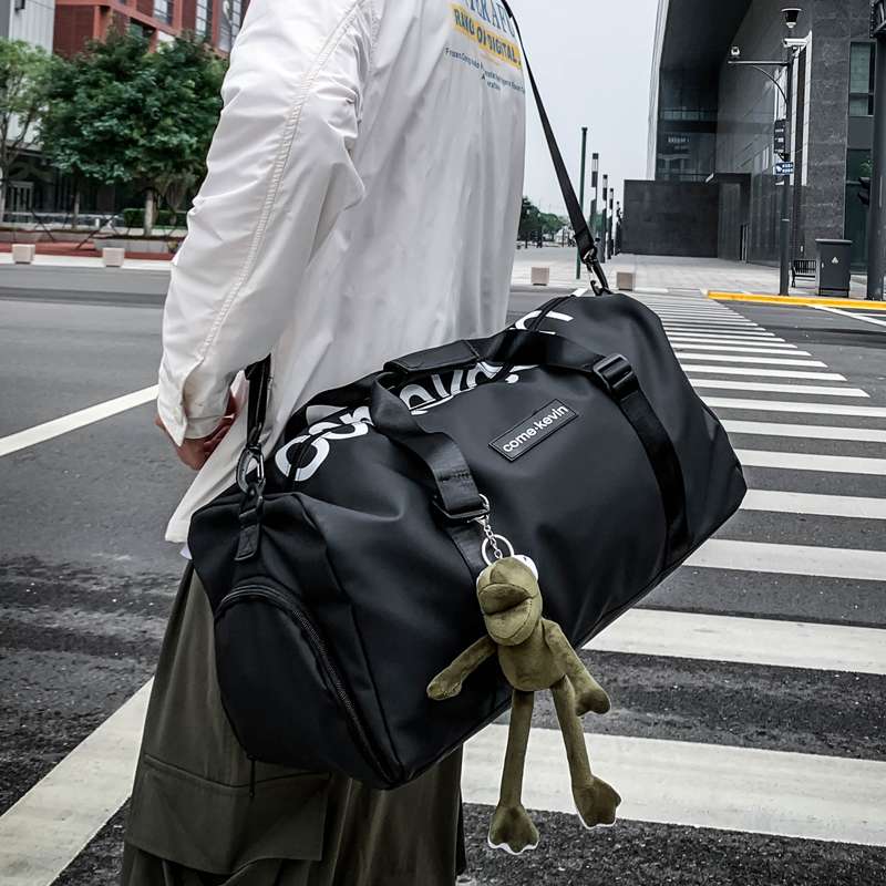 旅行バッグ 都会的旅人のカエル付きダッフルバッグ