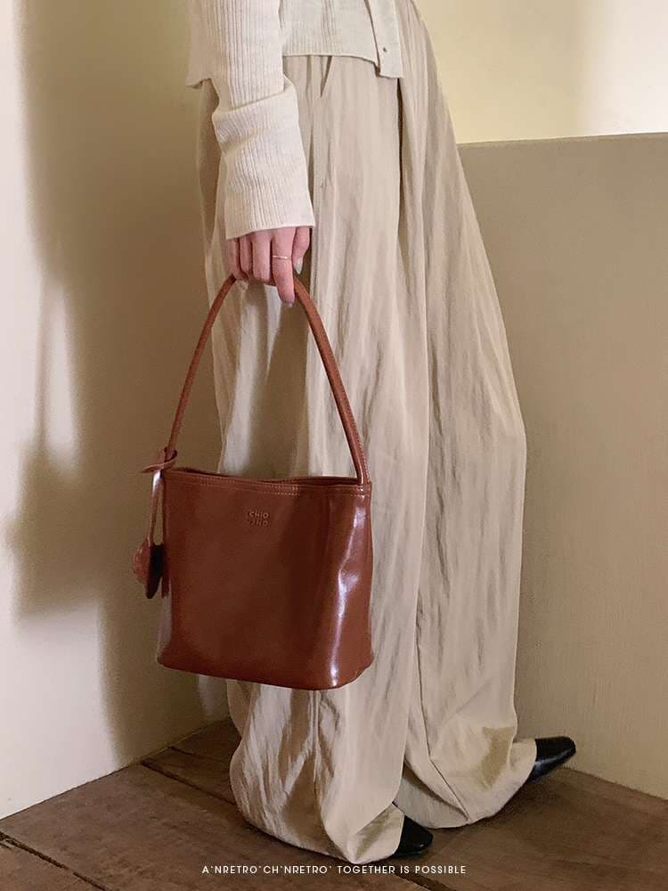 旅行バッグ リボンモチーフ付きシンプルトート