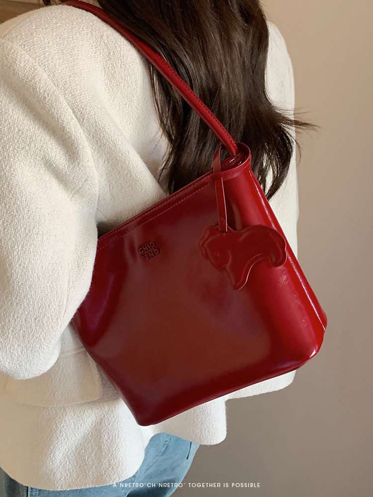 旅行バッグ リボンモチーフ付きシンプルトート